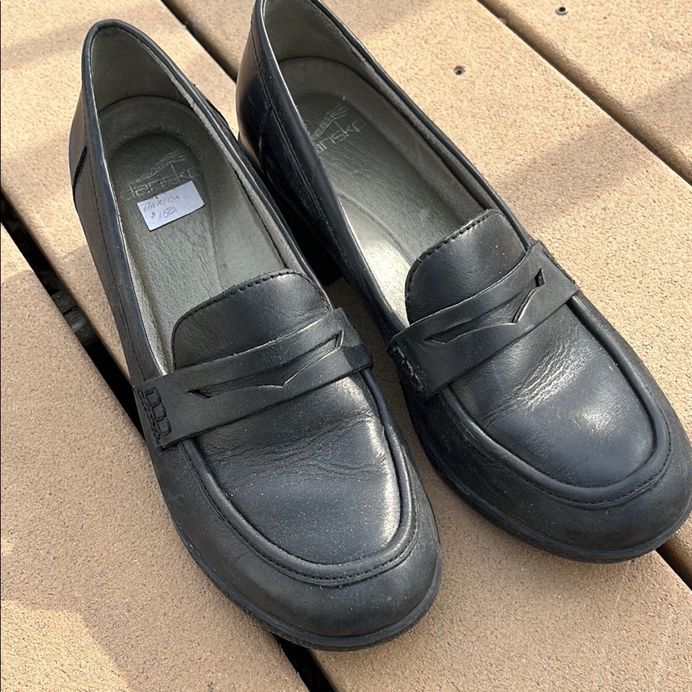 Dansko Black Leather Flats Sleek Professional Comfort